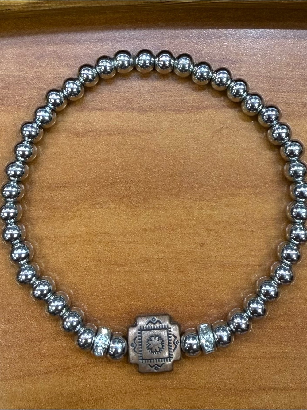 Sterling Silver Bead Stretch Bracelet with Antiqued Center Accent
